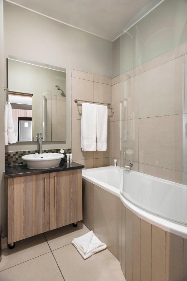 Cag The Atrium Rivonia Aparthotel Joanesburgo Exterior foto